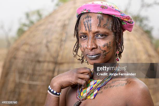 Portrait of a Mbororo woman with scarifications on her face.