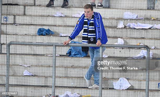 Supporter of Bielefeld looks dejected in the main stand after the Second Bundesliga Playoff Second Leg match between Arminia Bielefeld and Darmstadt...