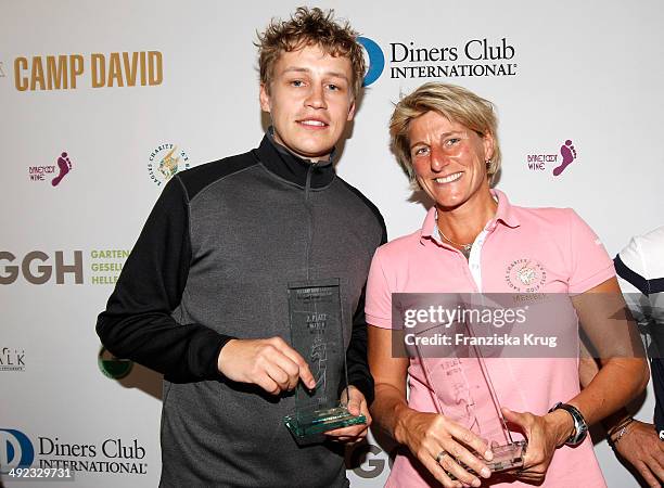 Tim Bendzko and Silke Rottenberg attend the 'Camp David Eagles Hauptstadt Golf Cup' on May 19, 2014 in Berlin, Germany.