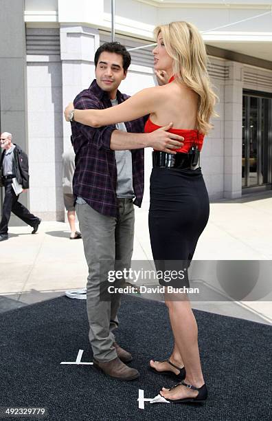 Host Shandi Finnissey Interviews Ramon Rodriguez at Westfield Century City on May 19, 2014 in Los Angeles, California.