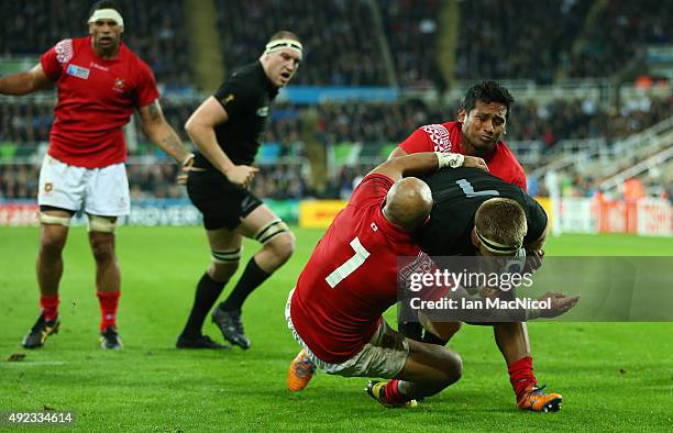 Sam Cane of New Zealand runs through to score a try during the 2015 Rugby World Cup Pool C match between New Zealand and Tonga at St James Park on...