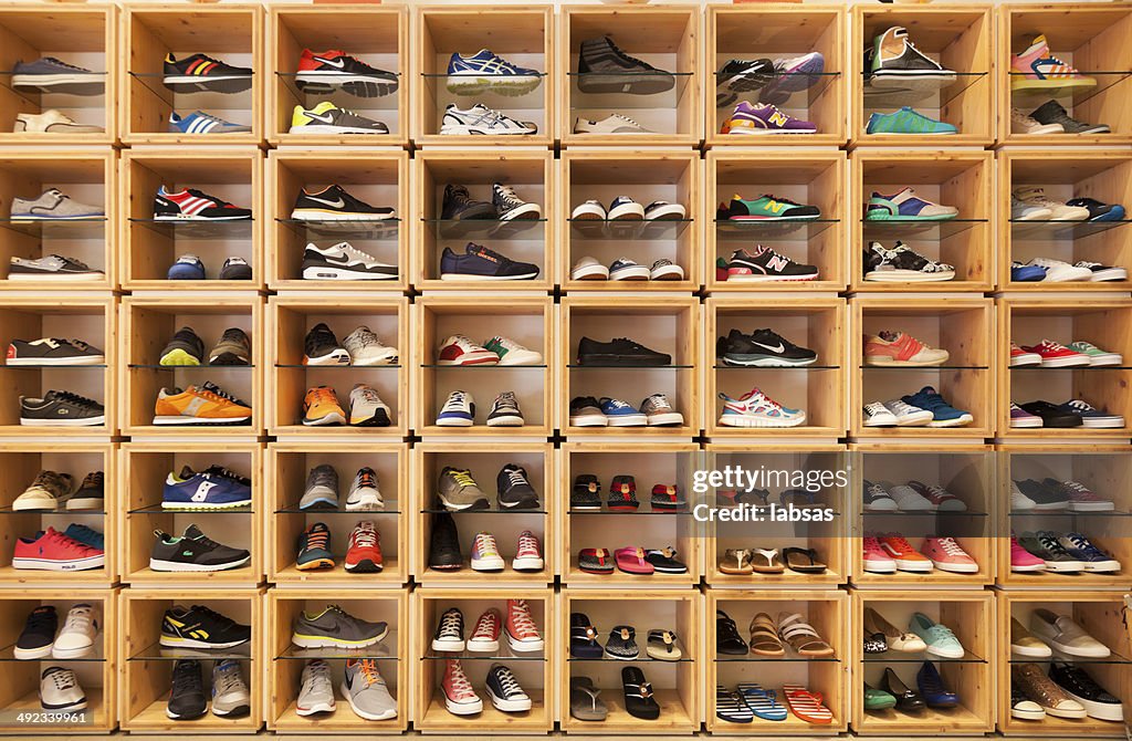 Different Shoes Displayed In A Shoe Shop High-Res Stock Photo - Getty ...