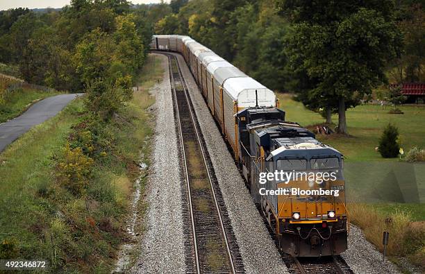Northbound CSX Corp. Auto rack freight train approaches Campbellsburg, Kentucky, U.S., on Thursday, Oct. 1, 2015. CSX Corp. Is scheduled to release...