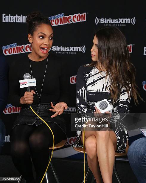 Lyndie Greenwood and Nikki Reed visit the SiriusXM Studios during New York Comic-Con at The Jacob K. Javits Convention Center on October 11, 2015 in...