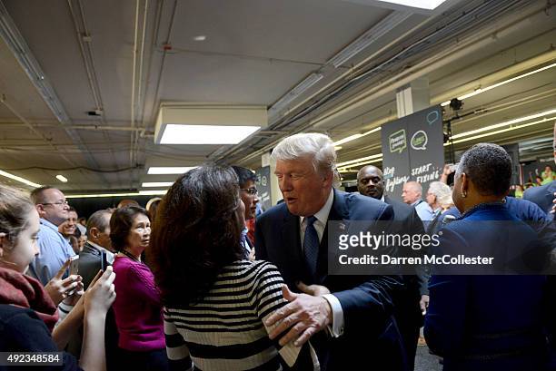 Republican Presidential candidate Donald Trump greets a supporter after speaking at the No Labels Problem Solver convention October 12, 2015 in...