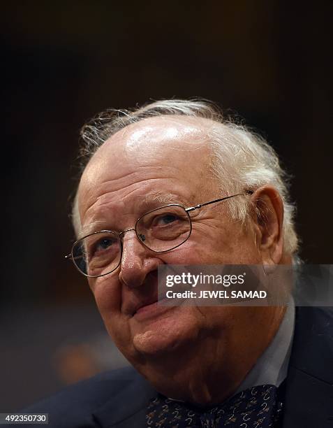 British economist Angus Deaton smiles during a press conference after winning the Nobel Prize for Economics at Princeton University in Princeton, New...