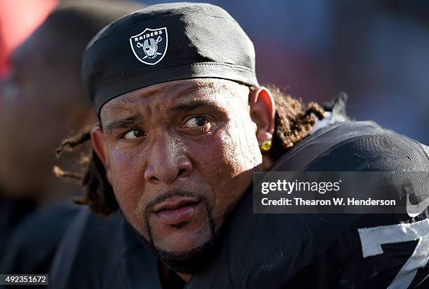 Donald Penn of the Oakland Raiders looks on from the sidelines against the Denver Broncos during the fourth quarter at the O.co Coliseum on October...