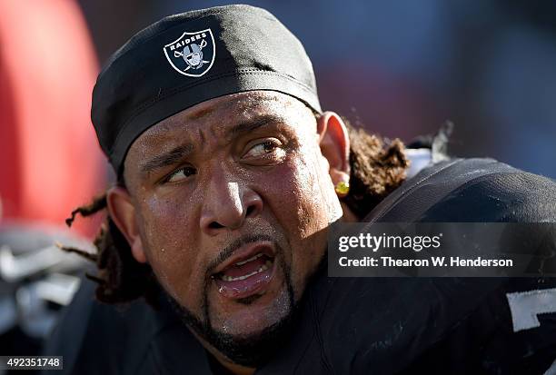 Donald Penn of the Oakland Raiders looks on from the sidelines against the Denver Broncos during the fourth quarter at the O.co Coliseum on October...