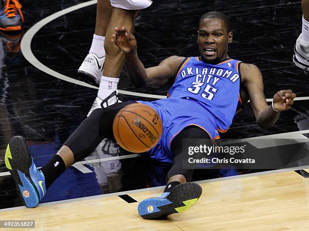 Kevin Durant of the Oklahoma City Thunder reacts in the first half while taking on the San Antonio Spurs in Game One of the Western Conference Finals...