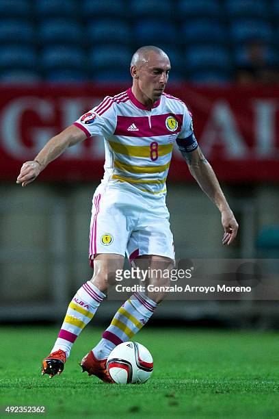 Scott Brown of Scotland during the UEFA EURO 2016 Qualifying round Group G controls the ball match between Gibraltar and Scotland at Estadio Algarve...