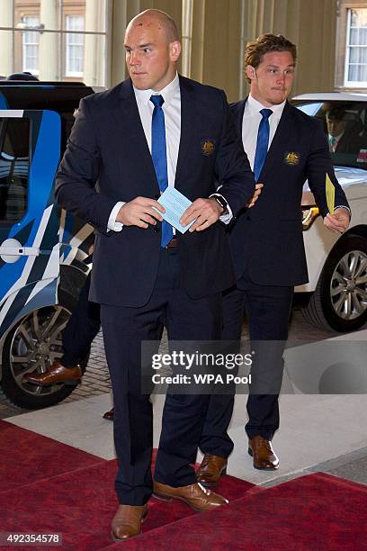 Australia's hooker and captain Stephen Moore and Australia's flanker Michael Hooper arrive for a reception to mark the Rugby World Cup 2015 at...