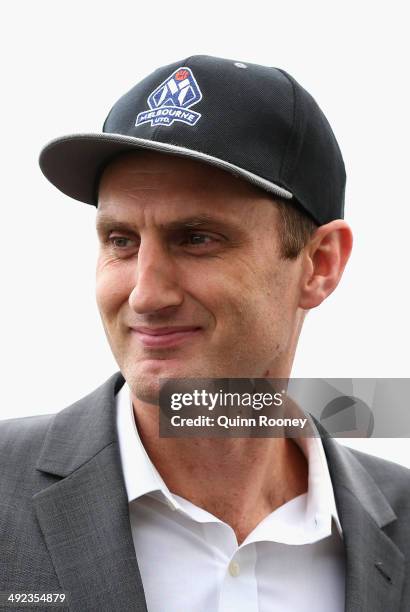 Chris Anstey the coach of United looks on during the Melbourne United NBL press conference at Melbourne United Head Office on May 20, 2014 in...