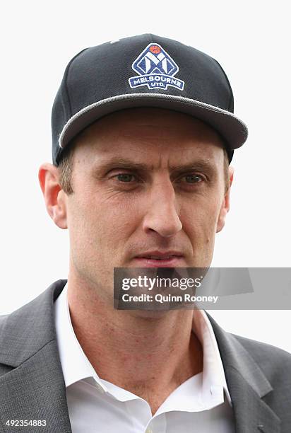 Chris Anstey the coach of United looks on during the Melbourne United NBL press conference at Melbourne United Head Office on May 20, 2014 in...