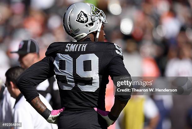 Aldon Smith of the Oakland Raiders looks on against the Denver Broncos at the O.co Coliseum on October 11, 2015 in Oakland, California.