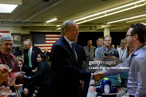 Republican Presidential candidate and former New York Gov. George Pataki greets guests at the No Labels Problem Solver convention October 12, 2015 in...