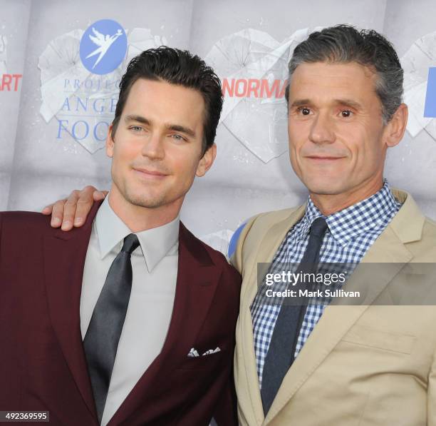 Actor Matt Bomer and Simon Halls attend the Los Angeles premiere of HBO's "The Normal Heart" at The Writers Guild Theatre on May 19, 2014 in Beverly...