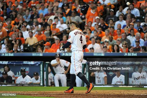 George Springer of the Houston Astros reacts after striking out to end the eighth inning against the Kansas City Royals during game four of the...