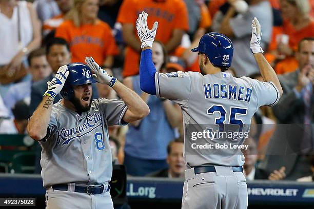 Eric Hosmer of the Kansas City Royals celebrates a two-run home run in the ninth inning with Mike Moustakas against the Houston Astros during game...