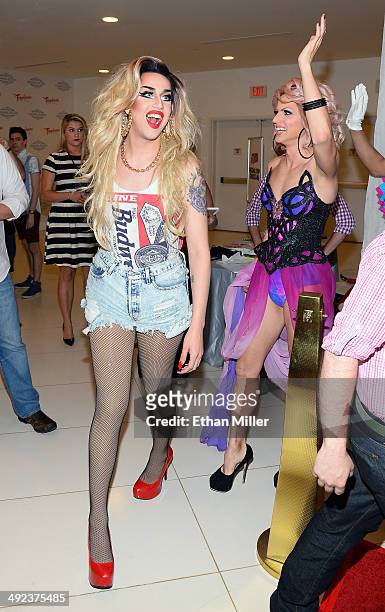 Two of the top three finalists of season six of "RuPaul's Drag Race" Adore Delano and Courtney Act arrive at a viewing party for the show's finale at...