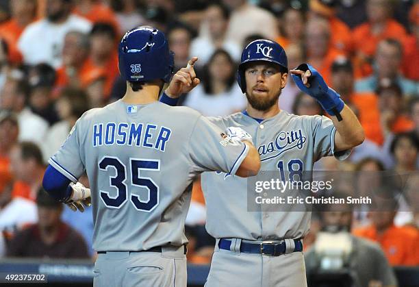 Eric Hosmer of the Kansas City Royals celebrates a two-run home run in the ninth inning with Ben Zobrist against the Houston Astros during game four...