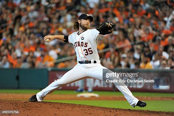 Josh Fields of the Houston Astros pitches in the ninth inning against the Kansas City Royals during game four of the American League Divison Series...