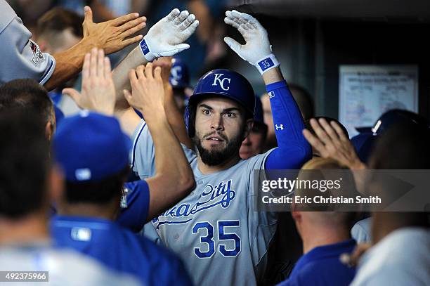 Eric Hosmer of the Kansas City Royals celebrates with teammates after hitting a two-run home run in the ninth inning against the Houston Astros...