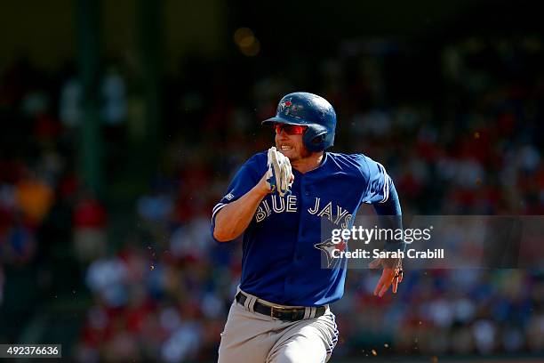 Josh Donaldson of the Toronto Blue Jays runs to third in the top of the third inning of Game 4 of the ALDS against the Texas Rangers at Globe Life...