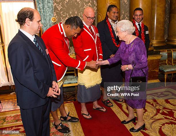 Queen Elizabeth II meets Uruguay's Sebastian Pineyrua , Tonga Head Coach Mana Otai , Samoa's Alesana Tuilagi and Mike Stanley at a Rugby World Cup...