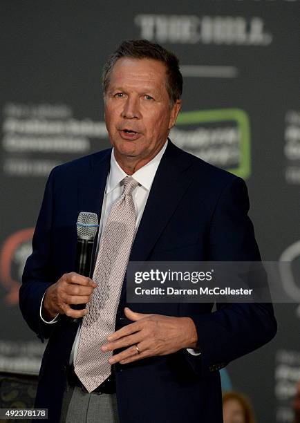 Republican presidential candidate John Kasich speaks at the No Labels Problem Solver Convention October 12, 2015 in Manchester, New Hampshire. Eight...