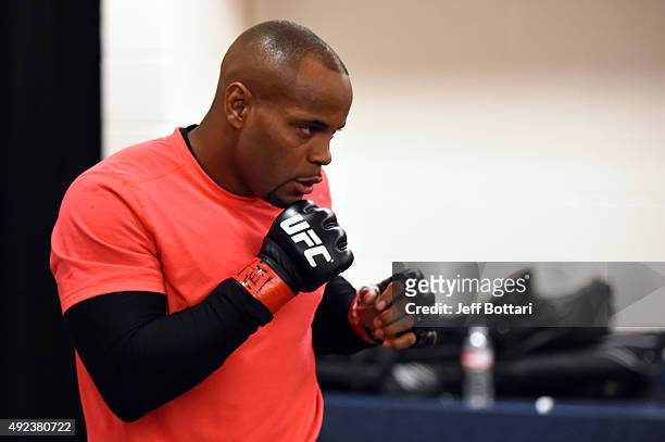 Daniel Cormier warms up backstage before facing Alexander Gustafsson of Sweden in their UFC light heavyweight championship bout during the UFC 192...