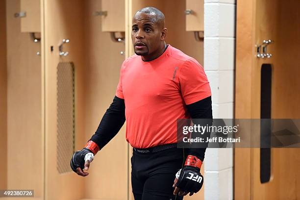 Daniel Cormier warms up backstage before facing Alexander Gustafsson of Sweden in their UFC light heavyweight championship bout during the UFC 192...