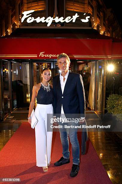 Of Hotel Barriere Dominique Desseigne and his companion Dancer Alexandra Cardinale attend the Fouquet's Paris Restaurant presents its Menu 'Twisted'...