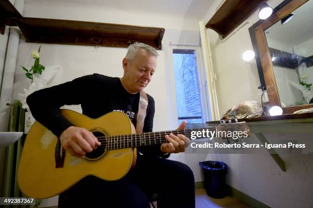 Australian musicist and author the guitarist Tommy Emmanuel poses in dressing room before his concert at Teatro Duse on May 7, 2014 in Bologna, Italy.