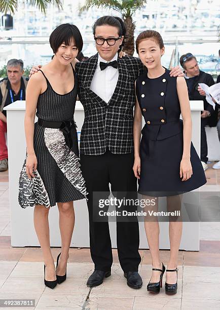 Actors Doona Bae, Song Sae Byuk and Kim Sae Ron attend the "A Girl At My Door" photocall at the 67th Annual Cannes Film Festival on May 20, 2014 in...