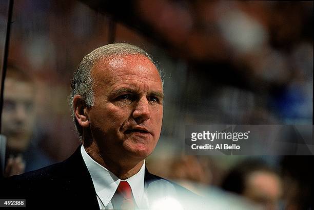 Jacques Lemaire of the New Jersey Devils looks on during the game against the New York Islanders at the Continental Airlines Arena in East...