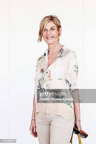 Actress Michele Laroque is photographed for Self Assignment on May 18, 2014 in Cannes, France.