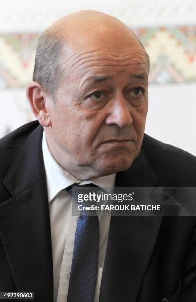 French Defence Minister Jean-Yves Le Le Drian meets with Algeria's Chief of Staff General Ahmed Gaid Salah upon his arrival at the Houari-Boumediene...