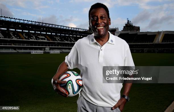 Brazilian football legend Pele poses in during a visit at stadium Vila Belmiro on May 17, 2014 in Santos, Brazil.