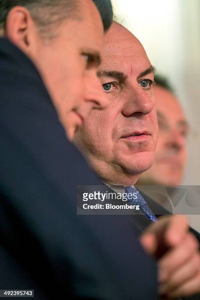 Philipp Hildebrand, vice chairman of BlackRock Intl., left, and Axel Weber, chairman of UBS AG, listen to a speaker during the Swiss International...