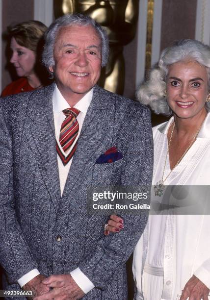 Actor Charles "Buddy" Rogers and wife Beverly Ricondo attend the 58th Annual Academy Awards Nominees Luncheon on March 13, 1986 at the Beverly Hilton...