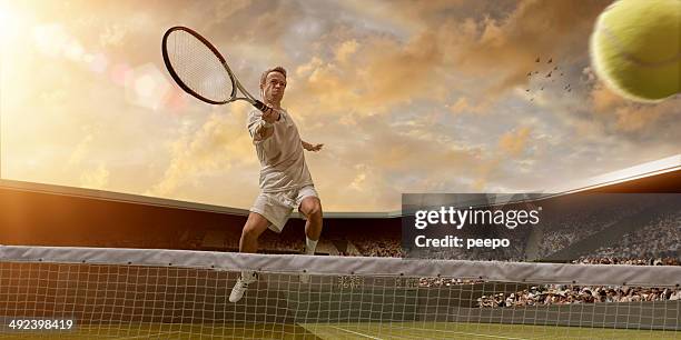 jogador de tênis em meados ar volley - tennis quick imagens e fotografias de stock