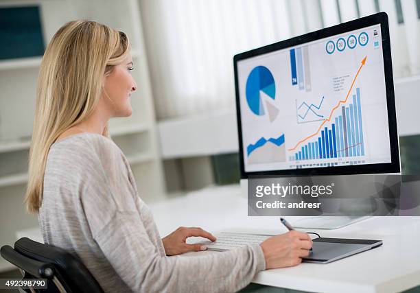 woman working at home online - big data stock pictures, royalty-free photos & images