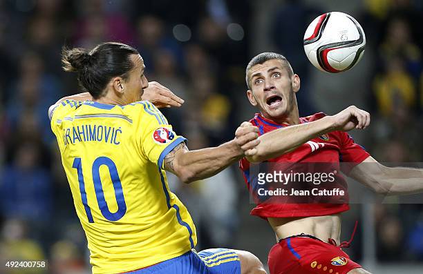 Zlatan Ibrahimovic of Sweden and Stefan Burghiu of Moldova in action during the UEFA EURO 2016 qualifier match between Sweden and Moldova at Friends...