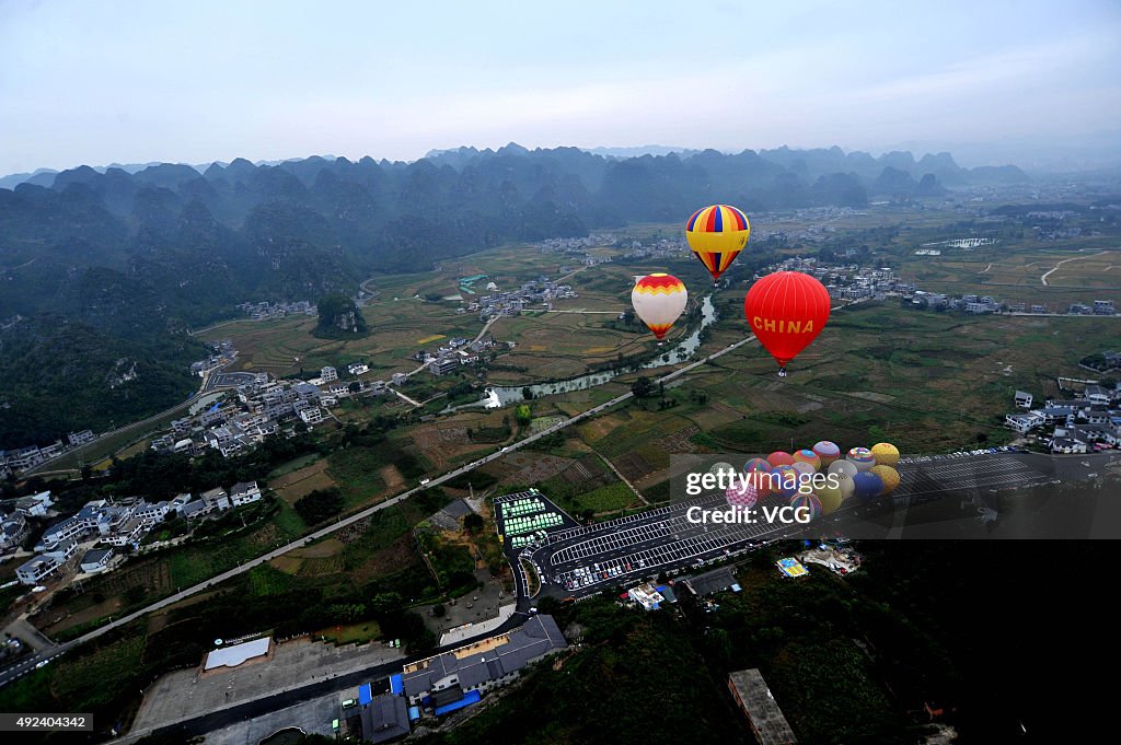 Fire Balloons Fly Above Karst During International Mountain Tourism Conference