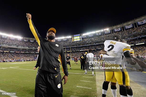 Head coach Mike Tomlin of the Pittsburgh Steelers and quarterback Mike Vick of the Pittsburgh Steelers celebrate after defeating the San Diego...
