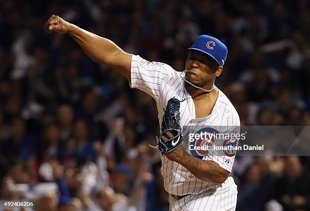 Pedro Strop of the Chicago Cubs reacts in the eighth inning against the St. Louis Cardinals during game three of the National League Division Series...