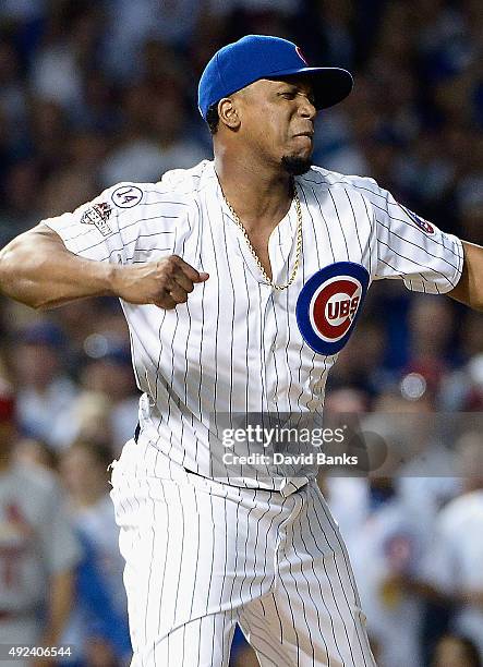 Pedro Strop of the Chicago Cubs reacts in the eighth inning against the St. Louis Cardinals during game three of the National League Division Series...