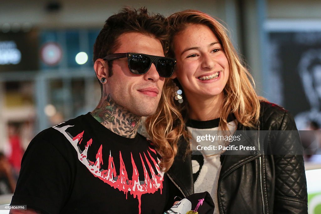 Fedez poses for a picture with his fan. The Italian rapper...