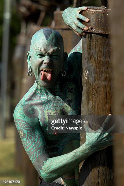 Erik Sprague, aka 'The Lizard Man', promotes the Buskers by the Creek festival at Currumbin Creek on the Gold Coast, Queensland.