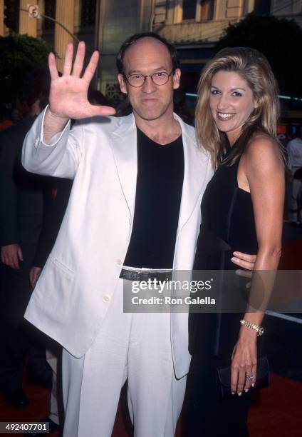 Director Charles Russell and date attend the "Eraser" Hollywood Premiere on June 11, 1996 at the Mann's Chinese Theatre in Hollywood, California.